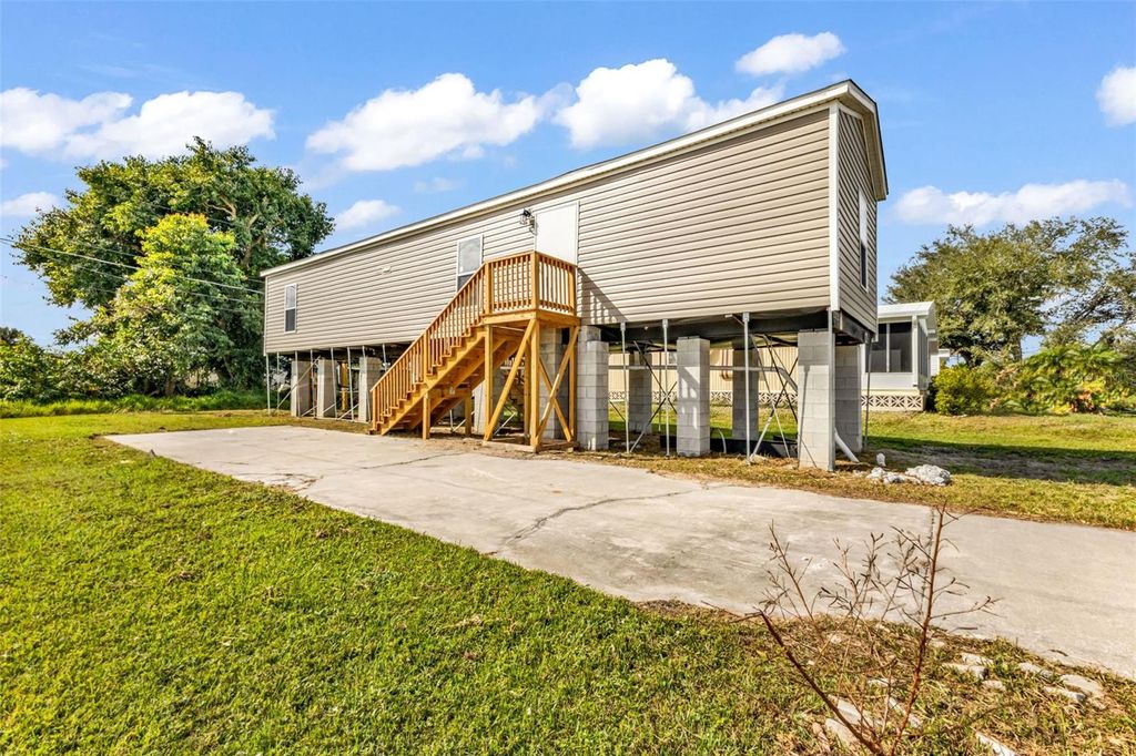 Photo of 3702 Dunreath Road, Port Charlotte, FL 33953 (MLS # C7518681)