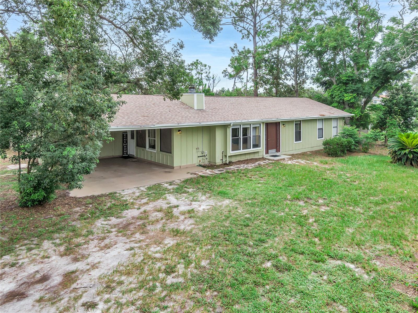 Discover the perfect blend of space, comfort, and freedom in this charming Florida home. Set on a giant, oversized lot and surrounded by lush, wooded, green space, this property offers the peace and privacy you’ve been looking for—all without the restrictions of an HOA. There’s even plenty of room to park your boat, RV, or other toys, making it easy to enjoy the Florida lifestyle to the fullest.
Step inside and you’ll find a welcoming floor plan with hard flooring throughout—a mix of timeless wood and easy-care tile. Large bedrooms give everyone the option to spread out and the cozy common areas, space to come together. A sprawling family room combines with the heart of this home, the kitchen. Featuring stylish butcher block countertops and modern cabinetry blending both good looks and function, this everyday living area is perfect for cooking, entertaining, and gathering with friends and family.
This home also features an air-conditioned mud room, providing a versatile space that can serve as extra storage, a craftsman’s workshop, or even a hobby area to bring your creative ideas to life!
With its oversized lot, wooded backdrop, and freedom to truly make it your own, this home is more than just a place to live—it’s a place to thrive in true Florida fashion. Don’t miss your chance to own this slice of paradise. See it and make it yours today!