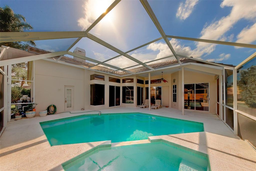 Photo of 3909 Talah Drive, Palm Harbor, FL 34684 (MLS # TB8493674)