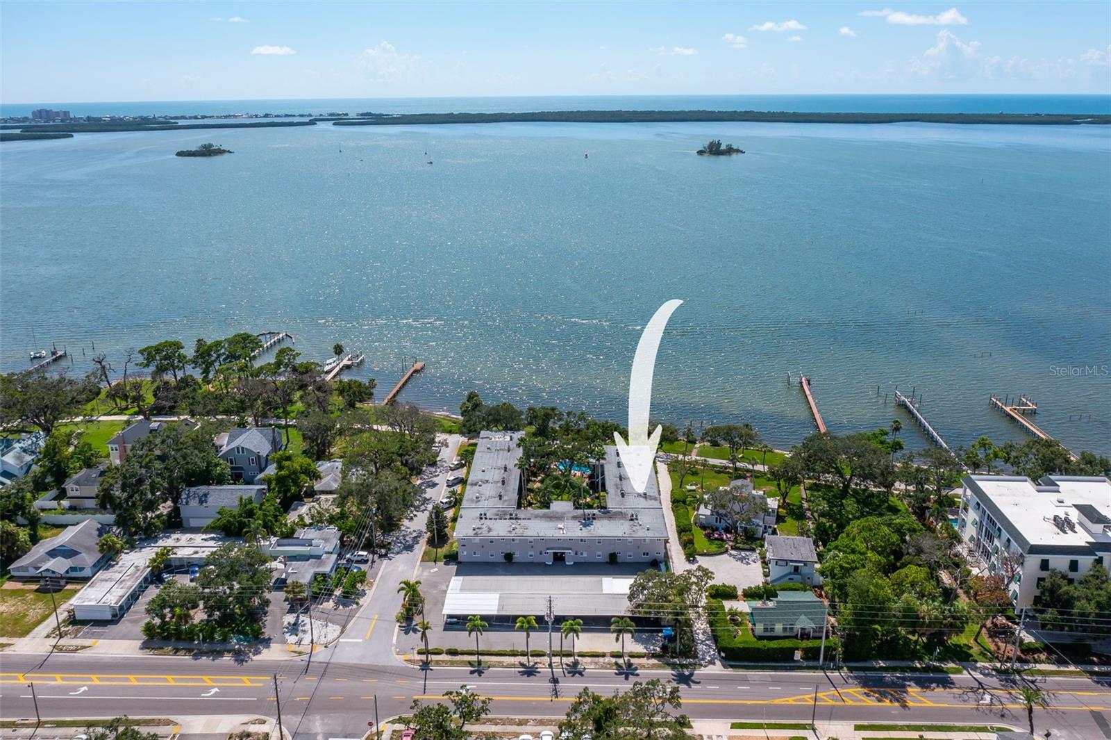 Welcome to The Victoria – Waterfront Living with Historic Charm, Just One Block Away from the Pinellas Trail! Rarely available, this furnished 2-bedroom, 2-bathroom condo in the exclusive 26-unit community of The Victoria offers a unique opportunity to enjoy serene waterfront living with spectacular sunset views in one of Dunedin’s most desirable locations. This turn-key, move-in ready condo that features a Brand New HVAC (2024) and Hurricane Impact Windows is perfect for winter getaways, weekend escapes, or as a highly desirable rental investment. Enjoy the vintage appeal of wrought iron balconies and a tropical brick-paved courtyard complete with a waterfall, resort-style swimming pool, and fitness center – all reminiscent of classic Floridian charm. Inside, the home blends timeless elegance with modern convenience, featuring custom wood cabinetry, Corian countertops, gas cooking, and a full-size in-unit washer and dryer. Outside, is a front patio area that is perfect for enjoying brilliant sunsets every evening. Just a short stroll brings you to historic downtown Dunedin, where you’ll find a vibrant mix of fine dining, local breweries, boutique shopping, art galleries, frequent festivals, a bustling marina, and beautiful parks. For outdoor enthusiasts, championship golf courses and award-winning beaches are only a quick drive away. Whether you're seeking your own private oasis or a savvy investment, this condo at The Victoria is a rare find. Schedule your showing today – and start living the Dunedin dream!