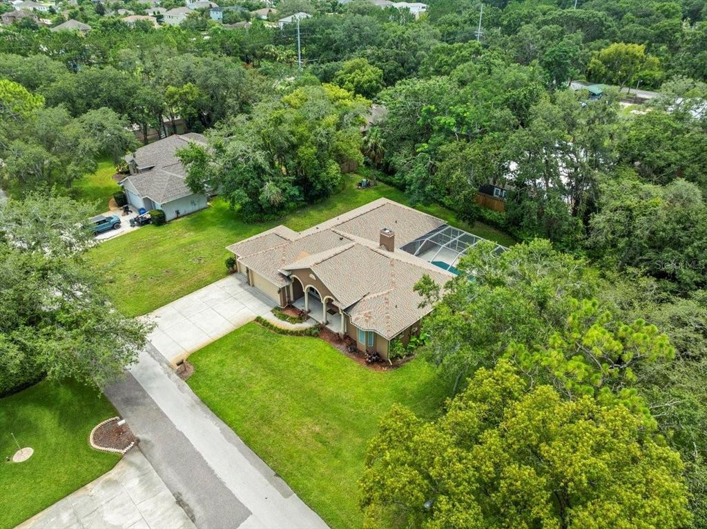 Photo of 2409 Heather Manor Lane, Lutz, FL 33549 (MLS # TB8402249)