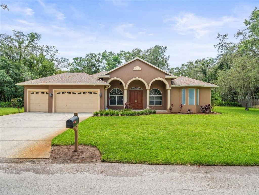 Photo of 2409 Heather Manor Lane, Lutz, FL 33549 (MLS # TB8402249)