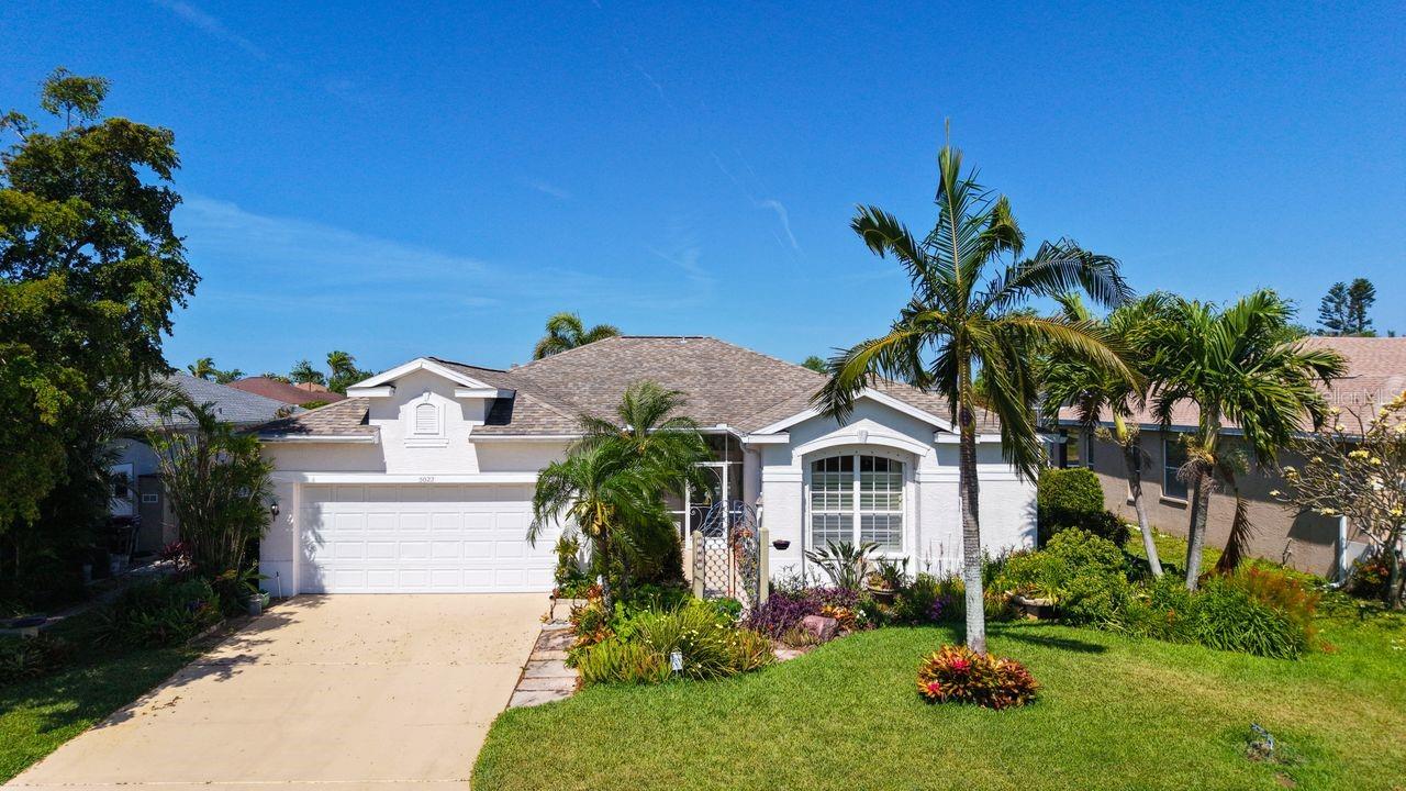Feel right at home in this well maintained, single-story thoughtfully landscaped, 3 bedroom 2 bath pool home with lovely water views. Situated in FLOOD ZONE X, this West Bradenton property offers added peace of mind and may not require flood insurance. Located in the desirable Glenn Lakes community, just minutes from IMG Academy, Detwiler’s Farm Market, and the Gulf Coast’s finest beaches including Anna Maria Island.
Step inside to an inviting open living room ideal for gatherings with family and friends. Sliding glass doors lead to the lanai, seamlessly extending the living space outdoors, perfect for enjoying the water and pool views, and bringing the outdoors in.
Just off the main living area, the kitchen offers a more defined layout featuring granite countertops, a new refrigerator (2023), and a dedicated space for both dining and casual seating. Bright and functional, it's thoughtfully designed for everyday living. A laundry room leads to the two-car garage for added convenience.
The split floor plan offers privacy, with the primary suite tucked away on one side of the home and two additional bedrooms (or optional den/office) on the other.
Updates include: refreshed lighting, new kitchen faucet, pool cage re-screening, and more.
Enjoy relaxing poolside or sipping coffee on your lanai as you take in the peaceful water views and vibrant sunset skies.
Glenn Lakes is a well-maintained community featuring a lakeside park and tennis court. Conveniently located near boating, golf, downtown Bradenton & Sarasota, SRQ Airport, area beaches and near to IMG Academy. Furniture optional. Florida lifestyle included.
Discover the charm and comfort of this move-in ready home, schedule your private showing today.