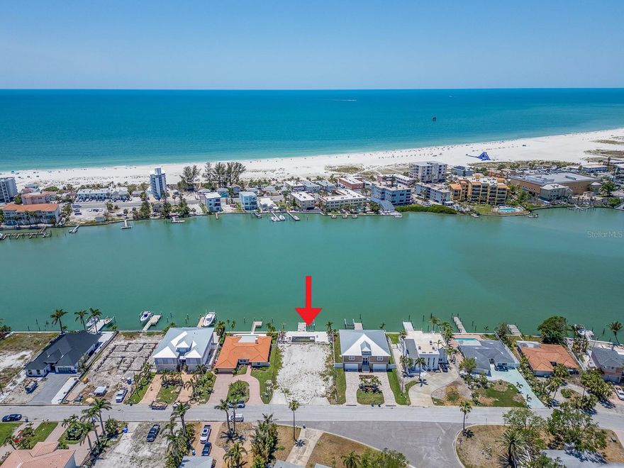 Prime Waterfront Location to create your Luxury Florida Dream Home 5 minutes from the Beach!! Lot is ready to build on! Almost a quarter acre, over 10,000 sq ft,  allows for a 3-story home with over 4,500 sq ft of living space, plus plenty of room for a luxury pool and outdoor entertainment. Plans and specs shown offer another option for building a 2-story home, est 2,500 sq ft of living space. Deep Water to allow for Big Boats! And the Views! WOW! This Direct Waterfront Location also provides nightly Sensational Sunsets - each one unique. Private dock with quick access to the Gulf! With easy access to Treasure Island, this location is also just a short drive to vibrant downtown St. Pete, including the new St Pete Pier, Dali Museum, restaurants, live music and entertainment all year long. Start living your dream today!