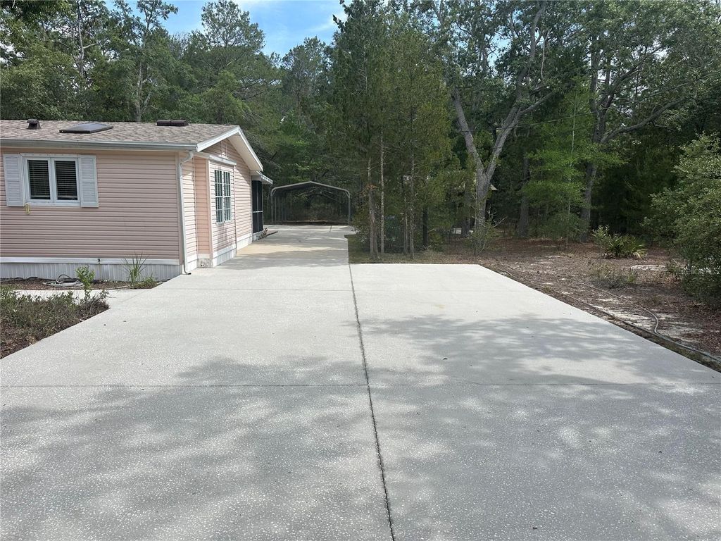 Photo of 8040 Cessna Drive, Spring Hill, FL 34606 (MLS # W7885502)