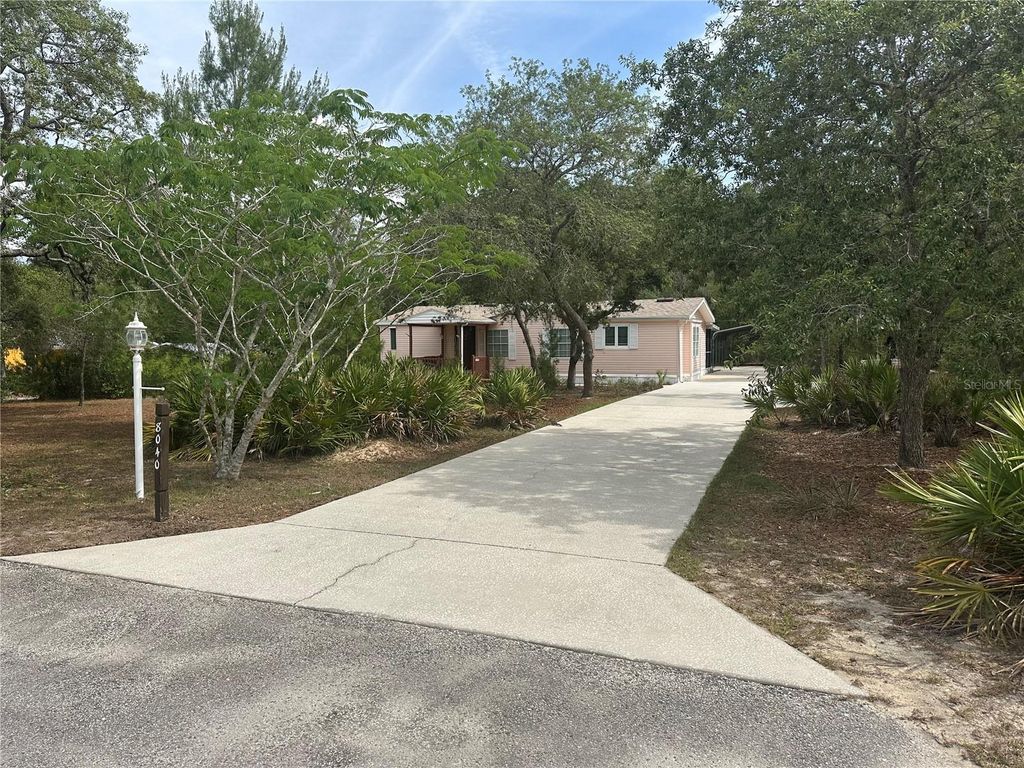 Photo of 8040 Cessna Drive, Spring Hill, FL 34606 (MLS # W7885502)