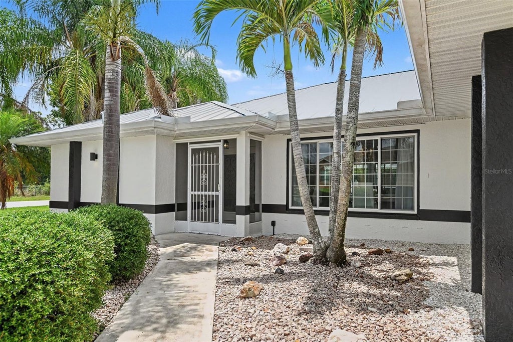 Photo of 23531 Dunstan Avenue, Port Charlotte, FL 33954 (MLS # V4949441)