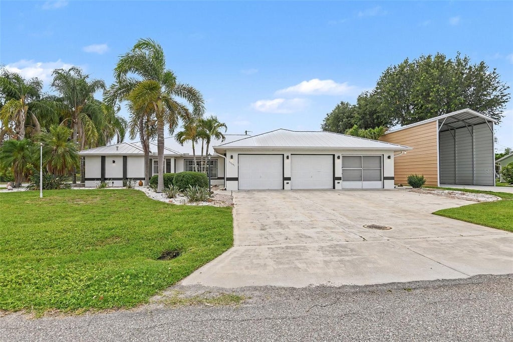 Photo of 23531 Dunstan Avenue, Port Charlotte, FL 33954 (MLS # V4949441)