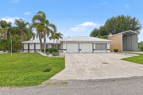 Photo of 23531 Dunstan Avenue, Port Charlotte, FL 33954 (MLS # V4949441)