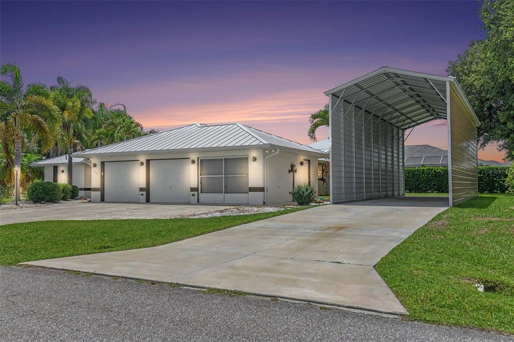 Photo of 23531 Dunstan Avenue, Port Charlotte, FL 33954 (MLS # V4949441)