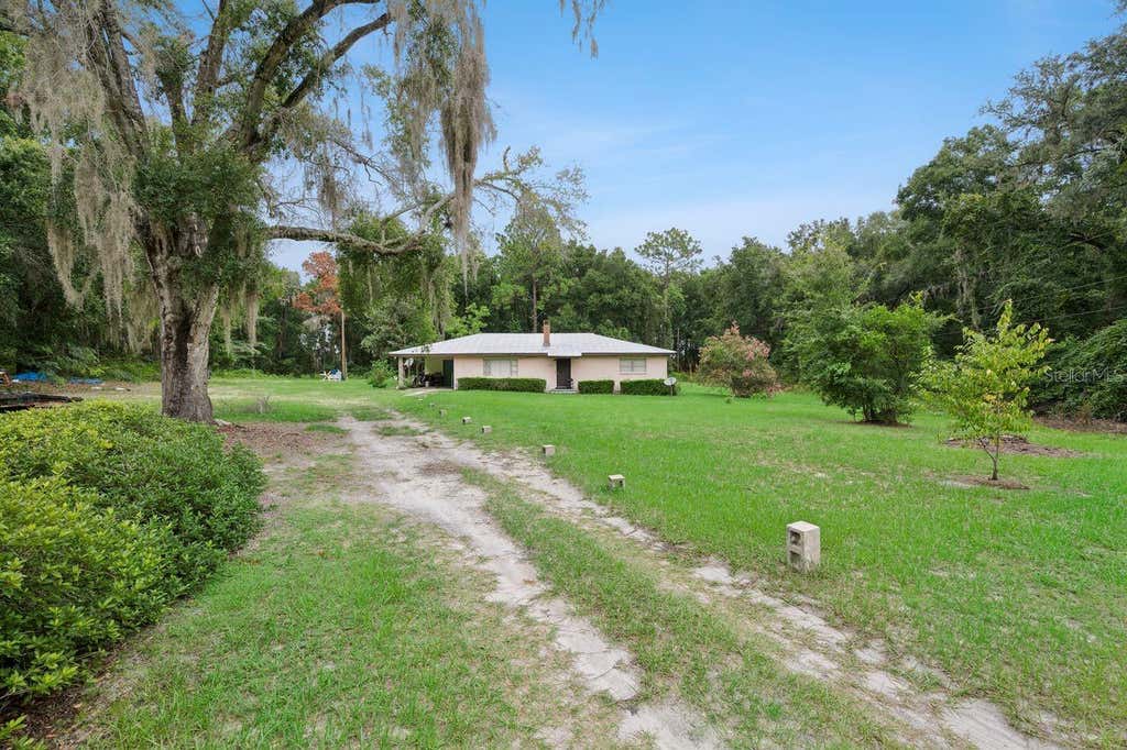 Photo of 6184 NE 54th Boulevard, Wildwood, FL 34785 (MLS # TB8534432)