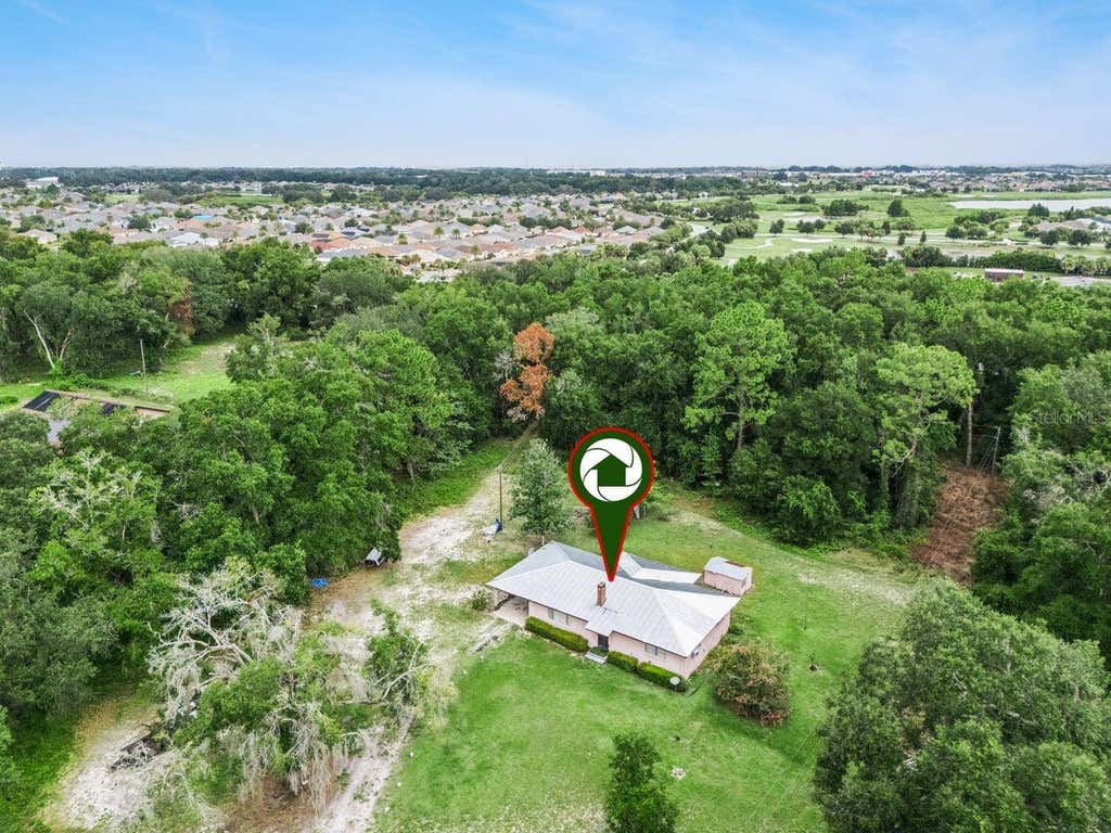 Photo of 6184 NE 54th Boulevard, Wildwood, FL 34785 (MLS # TB8534432)