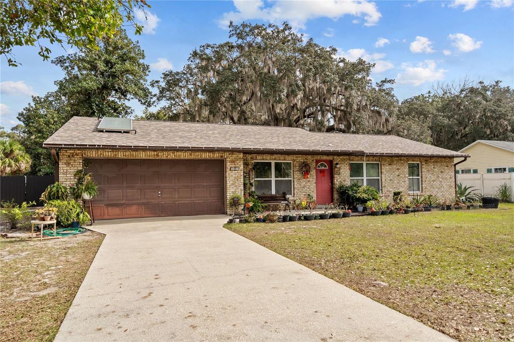 Photo of 32530 Purdum Avenue, Leesburg, FL 34788 (MLS # S5143008)