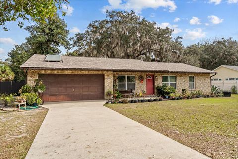 Photo of 32530 Purdum Avenue, Leesburg, FL 34788 (MLS # S5143008)