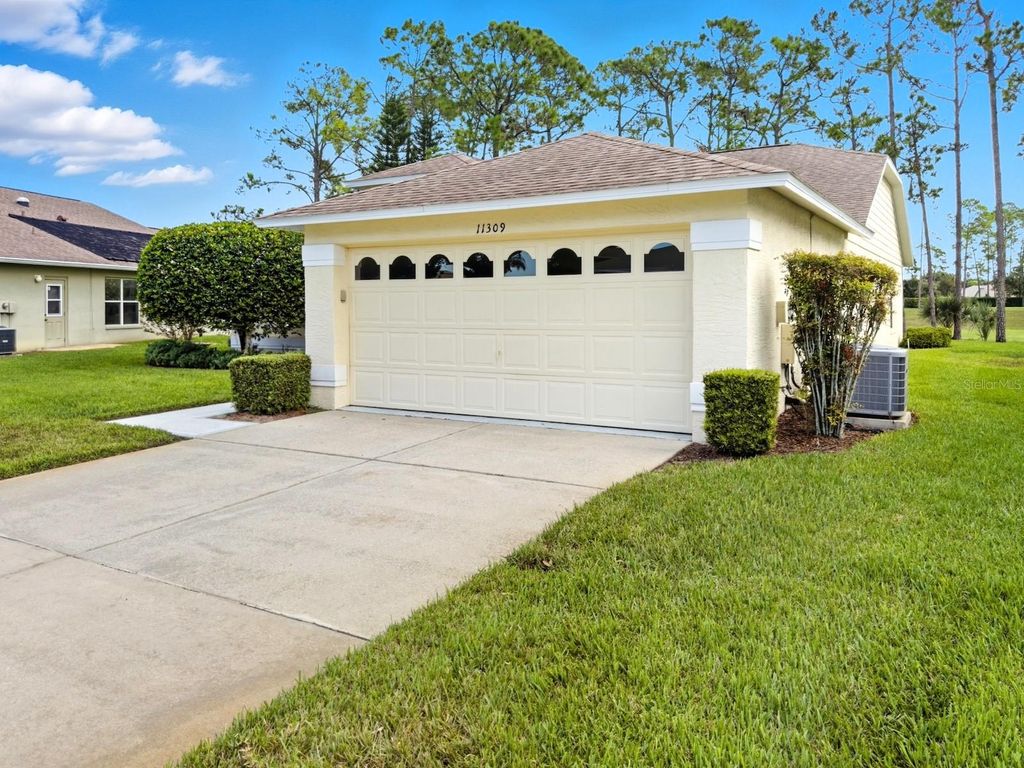 Photo of 11309 Sun Tree Road, Hudson, FL 34667 (MLS # W7879431)