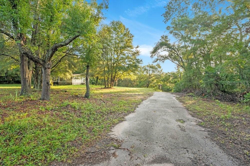 Photo of 4855 Round Lake Rd, Apopka, FL 32712 (MLS # O6449373)
