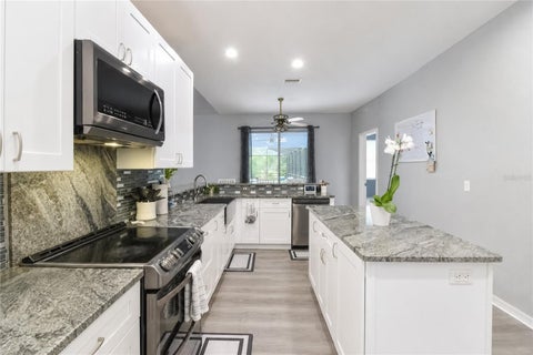 Tiny photo for 20130 SW 95th Street, Dunnellon, FL 34431 (MLS # TB8531470)
