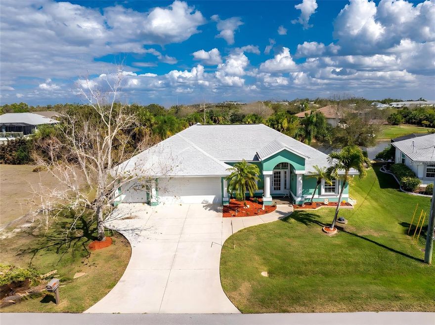 ** This one CHECKS ALL the BOXES ** ADJACENT LOT AVAILABLE | 4 Bedrooms | 3 Baths | 3 Car Garage | POOL | DOCK / LIFT | GULF ACCESS ~ 
Wake up to the sunrise and long, TRANQUIL CANAL VIEWS and the sound of seabirds greeting the morning. This beautifully designed waterfront home invites you to live the Florida boating lifestyle at its best — where every day feels like vacation...
Step inside to an OPEN, AIRY floor plan with VAULTED ceilings that immediately draws your eye to the WATER ~ EXPANSIVE SLIDING GLASS DOORS and LARGE WINDOWS fill the home with natural light while capturing the stunning sights of the canal.
** The chef friendly kitchen features a BREAKFAST BAR, TWO PANTRIES and a GAS STOVE ** An open living area makes entertaining effortless, whether you’re hosting friends by the pool or enjoying dinners with family ~ Outside, relax or play in your POOL and SPACIOUS LANAI — the perfect setting for year round gatherings.
For the boating enthusiast, this property offers DIRECT ACCESS to CHARLOTTE HARBOR and the GULF OF MEXICO. Launch right from your own 38’ COMPOSITE DOCK equipped with water, electric, and a COVERED BOAT LIFT — truly a boater’s paradise.
 ~ After a day on the water, retreat to the primary suite, featuring a canal view, DUAL WALK-IN CLOSETS and a spa inspired ensuite bath with a garden tub, walk-in shower, and double sinks. ** NEW ROOF in 2023 ** - every window and door is IMPACT RATED or HURRICANE PROTECTED, giving you peace of mind in all seasons**
Located in the highly desirable South Gulf Cove community, you’ll be close to world class fishing, miles of pristine beaches, golf courses, waterfront dining, boutique shopping, and fun island hopping — everything that makes Southwest Florida one of the most sought after destinations in the U.S.
The ADJACENT LOT is AVAILABLE for purchase under separate agreement, offering the option to expand your estate or build for family and friends nearby.
This home is priced to sell — and ready for you to start living the lifestyle others only dream about!!