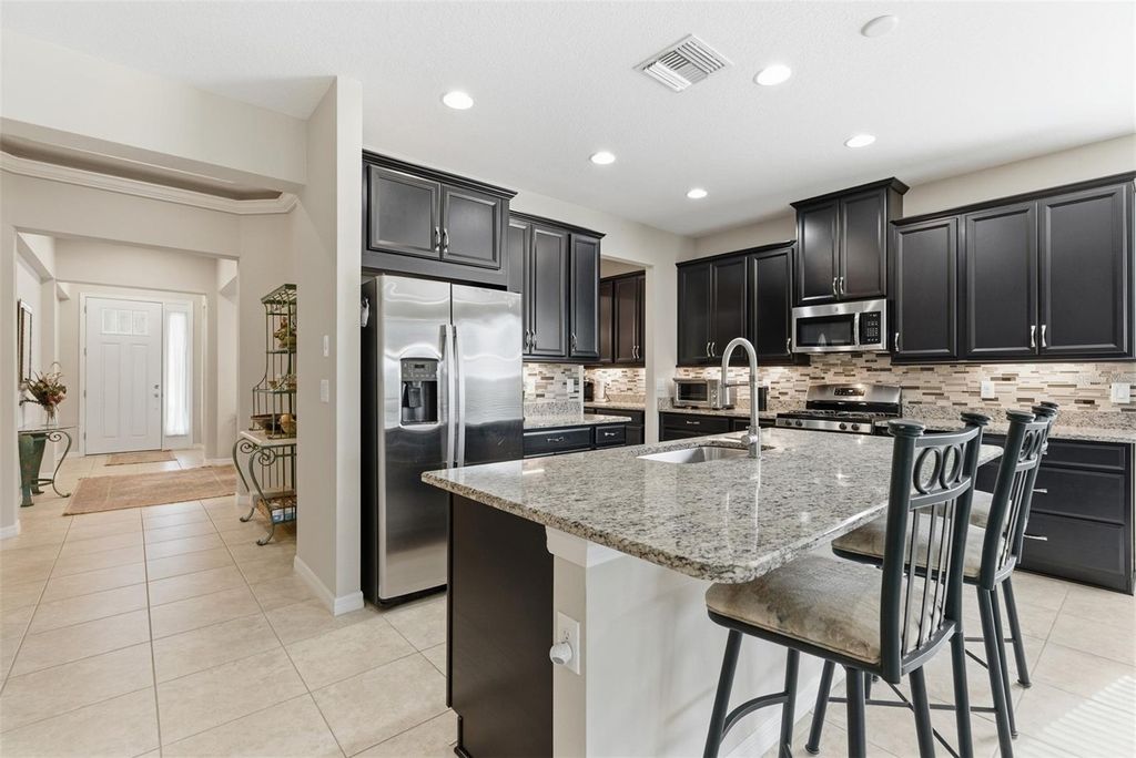 Photo of 5617 Maidenstone Way, Palmetto, FL 34221 (MLS # A4673222)