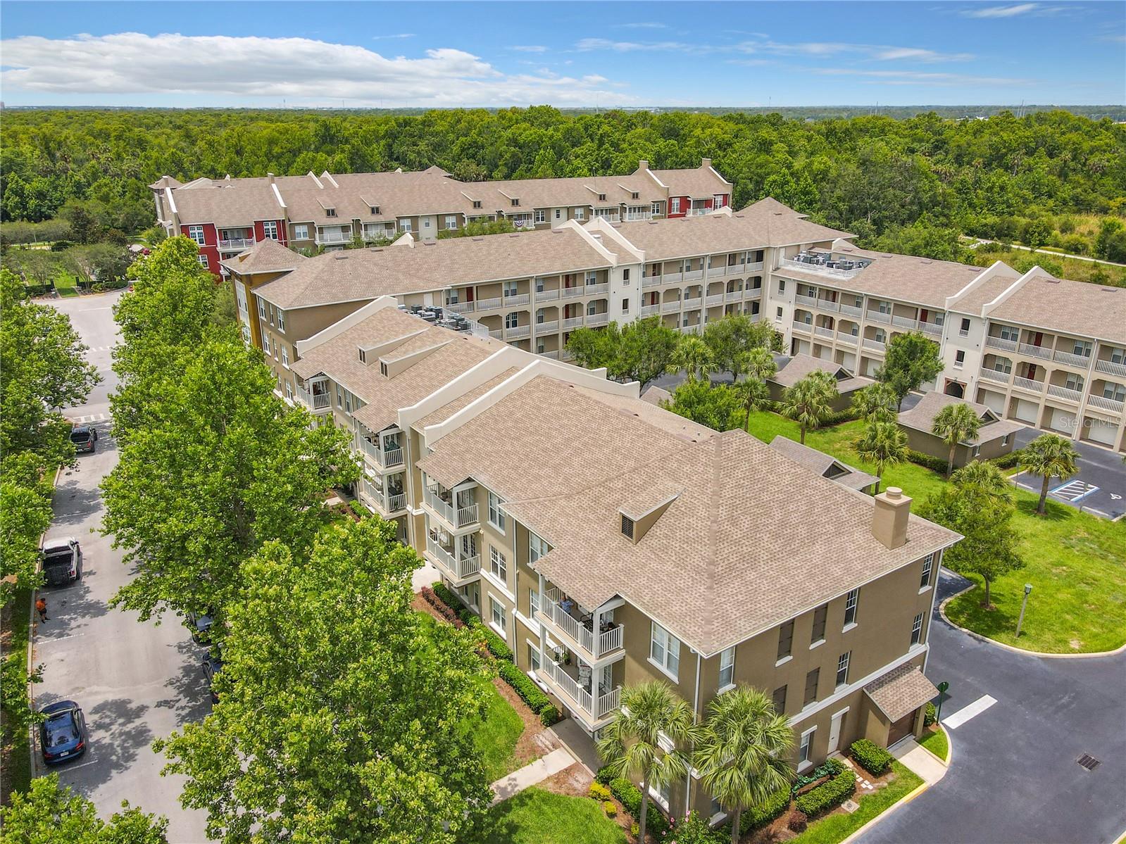 FULLY RENOVATED TOP FLOOR Artisan Club Condo-ELEVATOR ACCESS-1 CAR GARAGE-STORAGE UNIT. CHECK OUT THE 3D TOUR LINK.
Brazilian Koa Engineered Hardwood Floors throughout with Porcelain Tile in Bathrooms and Laundry. Plantation Shutters throughout.
NEW 2021: All new 4” Flat Panel Door Frames throughout.
REMODELED KITCHEN: All new (2021) GE PROFILE KITCHEN APPLIANCES: Cooktop, Combo Microwave/Convection Oven, 2ND Full Convection Oven with Air Fryer Option, French Door Refrigerator, Dishwasher, Range Hood, Stainless Single Basin Sink, Quartz Countertops and backsplash, Cherry Cabinetry.
REMODELED MASTER BATH (2021): CAMBRIA Quartz Countertops, Soft Close Cabinets, Kohler Soaking Tub with Cambria Quartz Surround and Waterfall Tub Filler, Walk-in Shower with Delta Rain Shower Head, Hand Held Shower Spray, Ultra-Clear Low-Iron Glass with EZ Care Shield for low maintenance, Ceiling to Floor Porcelain Tile, Comfort Height Kohler Toilet, Glass Vessel Sinks with Waterfall Faucets, Backlit Dimmable LED Lighted Mirrors with Anti-fog setting, LED Dimmable overhead lighting, under cabinet lighting, shower and bath lighting, glass mosaic backsplash to ceiling, custom metallic paint.
REMODELED SECONDARY BATH (2021): Walk-in Shower with ceiling to floor porcelain tile, Delta Rain Shower Head with Handheld Shower Spray, Comfort Height Kohler Toilet, CAMBRIA Quartz Countertop with Waterfall Edge, Glass Vessel Sink with Waterfall Faucet, custom Metallic Paint.
REMODELED HALF BATH (2021): CAMBRIA Quartz Floating Countertop with Glass Vessel Sink and Glass Waterfall Faucet, Custom Metallic Paint.
MASTER BEDROOM: Custom Closet Organizer. Tray Ceiling with Ceiling Fan and Barn Door to Master Bathroom
BEDROOM 2: Walk-in Closet and Ceiling Fan
BEDROOM 3: Custom Closet Shelving for Storage and Ceiling Fan
AC Replaced in 2014 and is under an annual Maintenance Contract
New (2022) High Efficiency Water Heater
Interior Painted 2022 – All walls, doors, trim, ceilings
1 Car Garage and Storage Unit Assigned.
Ownership comes with full privileges of the exclusive Artisan Park Clubhouse complete with a resort-style heated salt water chlorinated pool and waterfall spa, a state-of-the-art fitness center with men’s and women’s locker rooms, restaurant and bar, a multipurpose room, summer kitchen, billiards, plasma TV's, and lounging areas. The club hosts numerous events and classes, happy hours, and holiday parties! Close to Disney Theme Parks & Resorts, approximately 20 minutes to Orlando's International Airport! Easy access to I-4, the 417 and 429, approximately 1 hour to beaches on both coasts.