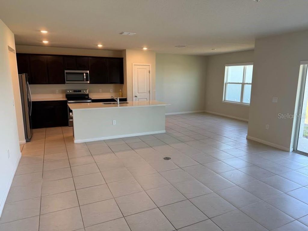 Photo of 1963 Enchanting Court, Davenport, FL 33896 (MLS # OM721648)