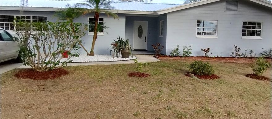 All NEW Flooring, Kitchen Appliances, Cabinets, Counter tops, Hot Water heater, A/C.    Roof is less than 6 years old. Painted throughout.   It's like brand new.!!  Completely refurbished home.   Spacious with the Family life in mind.  Kitchen is open to the great room.  Large Great room, living room, family room has lot's of space, 4 bedrooms, 3 baths, this home has space for the entire family, and a room for everyone.  Exterior has been primed and painted including the roof.