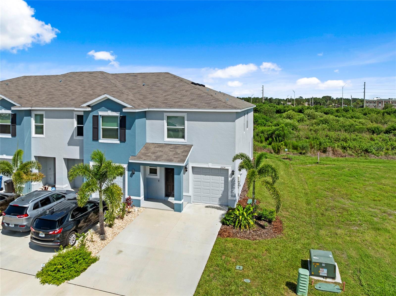 **LOCATION, AGE OF HOME, NO PET BREED RESTRICTIONS, LARGEST FLOORPLAN, CLOSING COST ASSISTANCE, LOW HOA!**
Discover the perfect blend of comfort and elegance in this stunning open-concept corner unit home, designed for both lively gatherings and tranquil evenings. The spacious kitchen is a dream, featuring abundant cabinet and countertop space, along with a generous island that draws everyone together. Step into the living room and seamlessly transition to the lanai, where you'll be greeted by serene views of a lush conservation area, offering a peaceful retreat right in your backyard. Venture upstairs to find a versatile loft area that can easily transform into a home office, an extra living space, or a creative craft room tailored to your needs. The primary bedroom is a true sanctuary, occupying the entire back of the home and boasting an oversized ensuite bathroom and two expansive walk-in closets for all your storage needs. The front of the home features two inviting guest rooms connected by a convenient Jack and Jill bathroom, ensuring privacy and accessibility for family and friends alike. This home sits on a generous .07-acre lot, significantly larger than typical interior units, and basks in southern exposure, allowing you to enjoy breathtaking sunrises and sunsets daily. When you're away from home, you'll enjoy the convenience of the Smart Home package for easy access to doors and thermostat. For the outdoor enthusiast, endless adventures await with the Manatee River, state parks, Anna Maria Island, and Longboat Key just a short drive away. The vibrant communities of Bradenton and Sarasota offer a rich array of recreational sports leagues for all ages, as well as some of Florida’s finest golf courses within minutes of your door. Convenience is key at Braden Pointe, with a diverse selection of shopping and dining options nearby, including the renowned University Town Center, one of Florida’s premier shopping malls. Don’t miss out on this incredible opportunity to make this charming home your own!