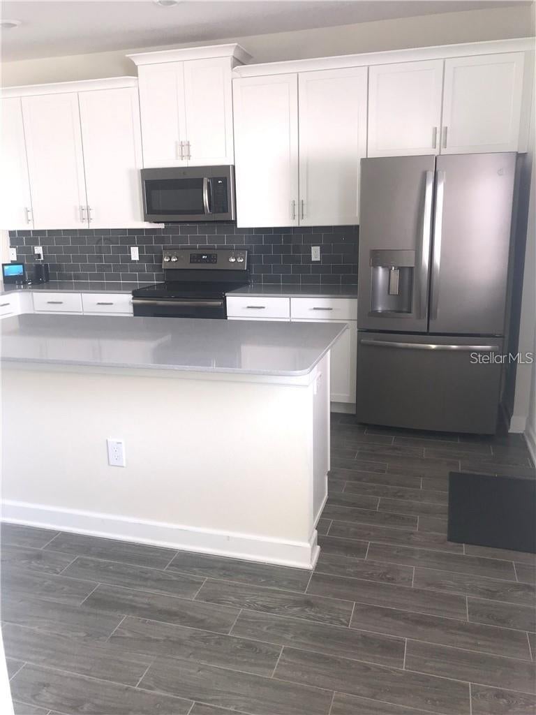 Photo of 11761 Fiction Avenue, Orlando, FL 32832 (MLS # O6443918)