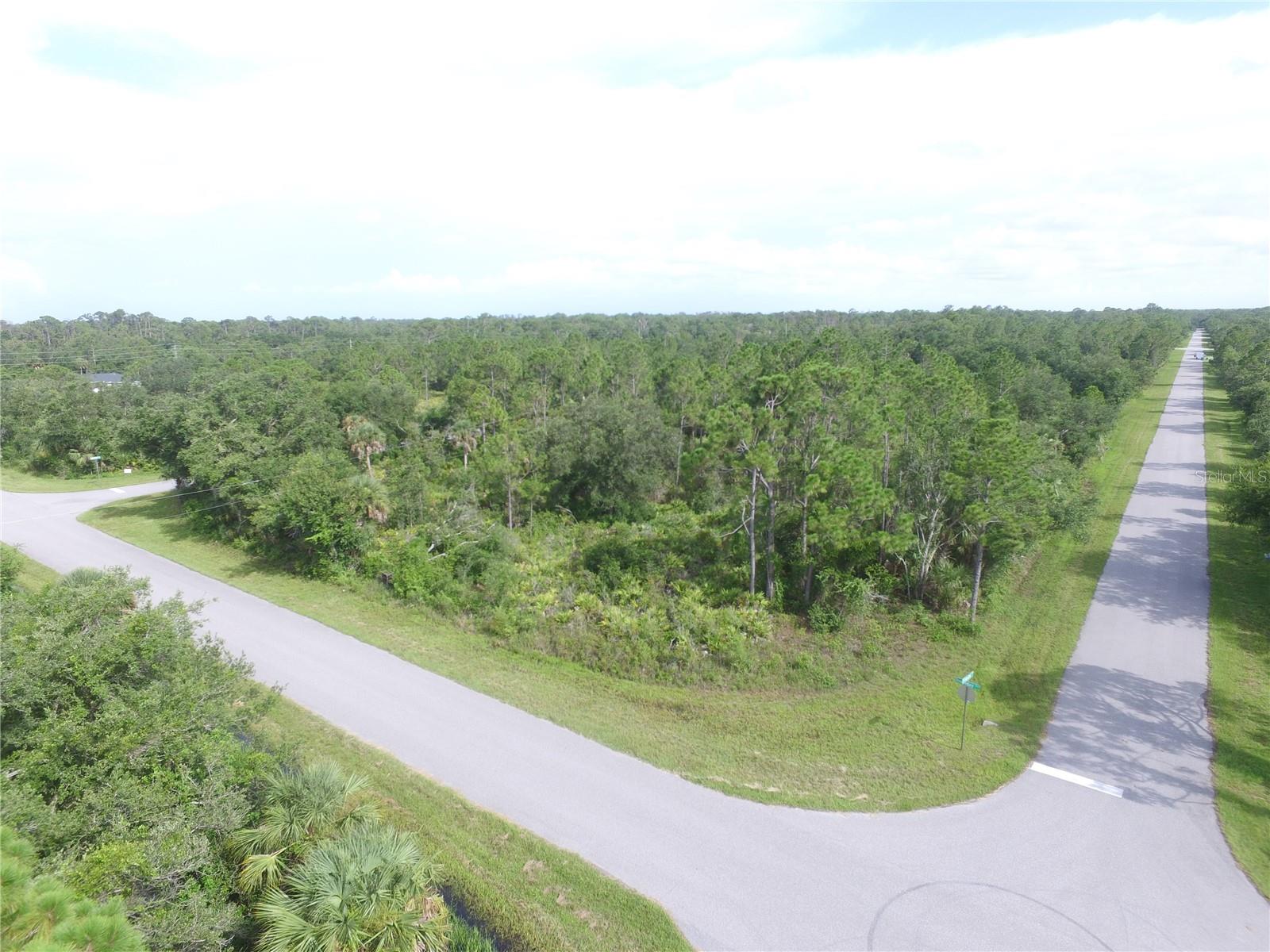 Spacious double lot totaling 1/2 acre in quiet neighborhood. Perfect for building your dream home, this parcel offers ample space for custom designs, landscaping, or outdoor amenities. Conveniently located just 2 miles from major shopping destinations, including Walmart and Home Depot, providing easy access to everyday essentials. Ideal opportunity for developers, investors, or homeowners seeking a peaceful setting with urban conveniences nearby.