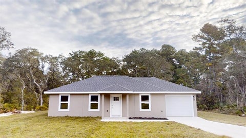 Photo of 2571 SW Uplands Avenue, Dunnellon, FL 34431 (MLS # OM734482)