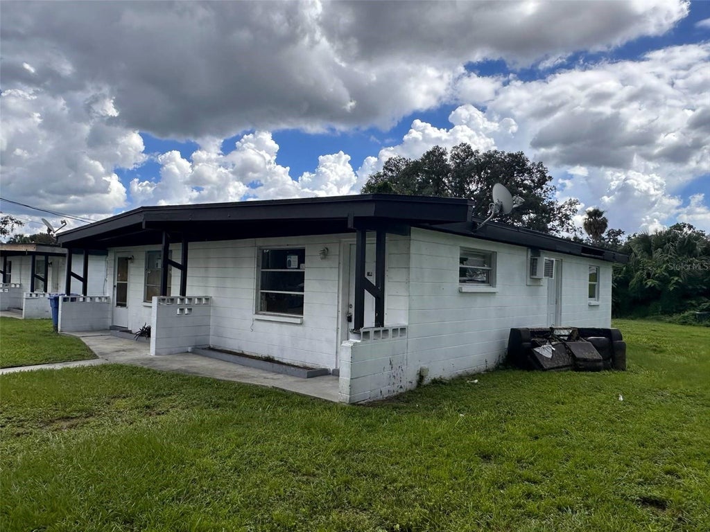 Photo of 921 E 122nd Avenue, Tampa, FL 33612 (MLS # TB8546611)