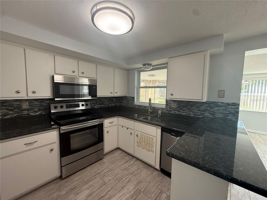 Photo of 5412 Golden Nugget Drive, Holiday, FL 34690 (MLS # W7882426)