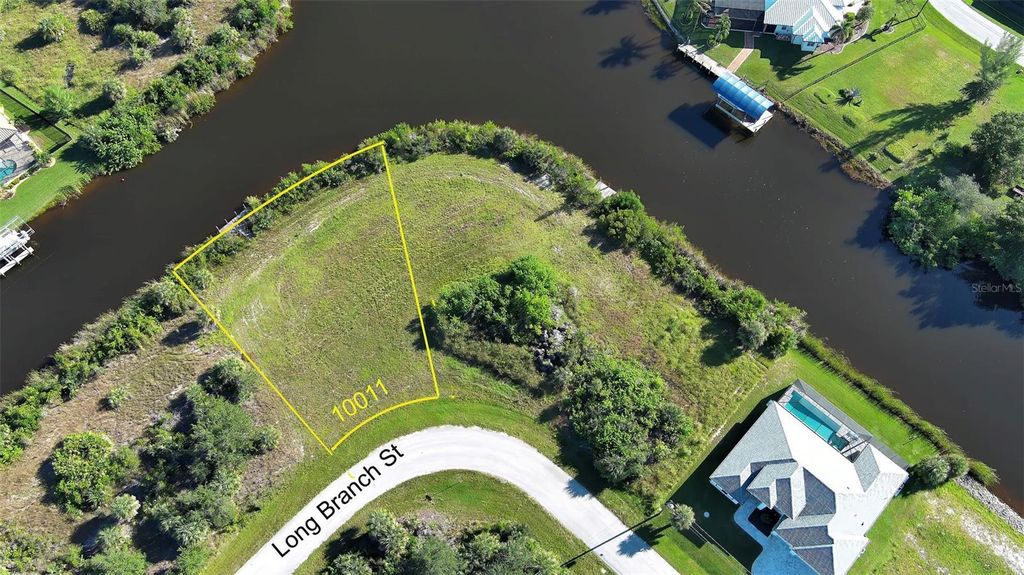 Photo of 10011 Long Branch Street, Port Charlotte, FL 33981 (MLS # C7515548)
