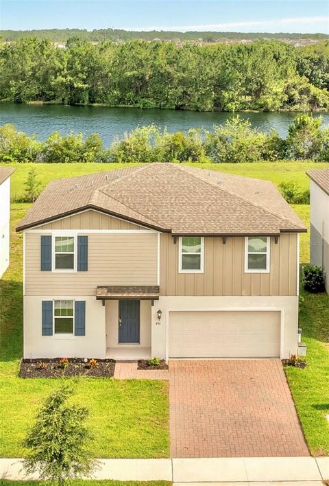 Photo of 491 Whistling Duck Trail, Saint Cloud, FL 34771 (MLS # O6313749)