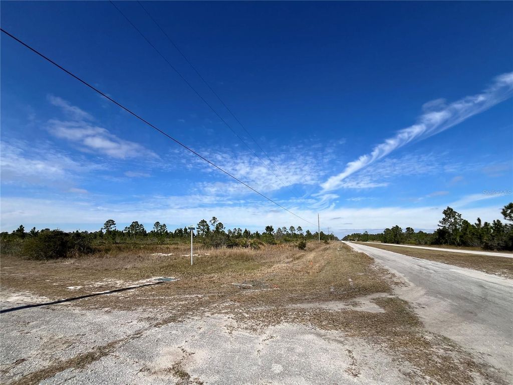 Photo of 402 Belmonte Drive, Indian Lake Estates, FL 33855 (MLS # P4933245)