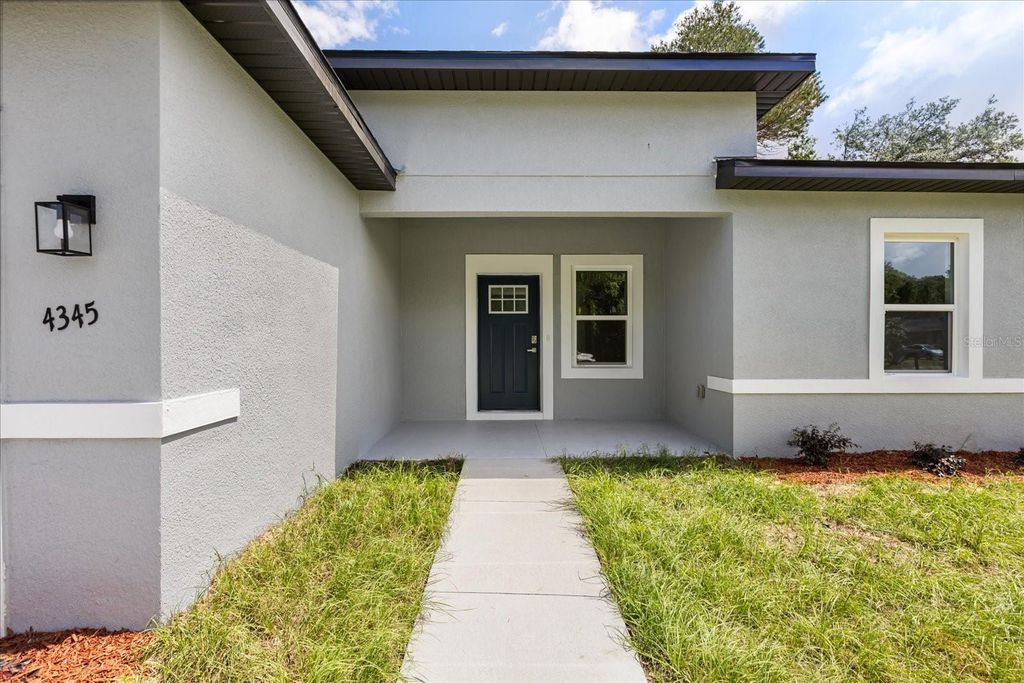 Photo of 4345 SW 143rd Ln Road, Ocala, FL 34473 (MLS # O6354044)