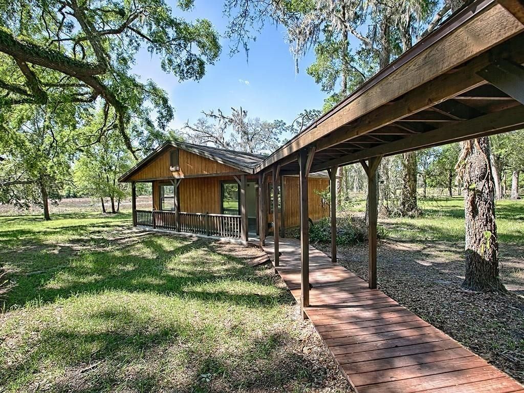 Photo of 11469 SW 49th Plaza, Webster, FL 33597 (MLS # O6352265)