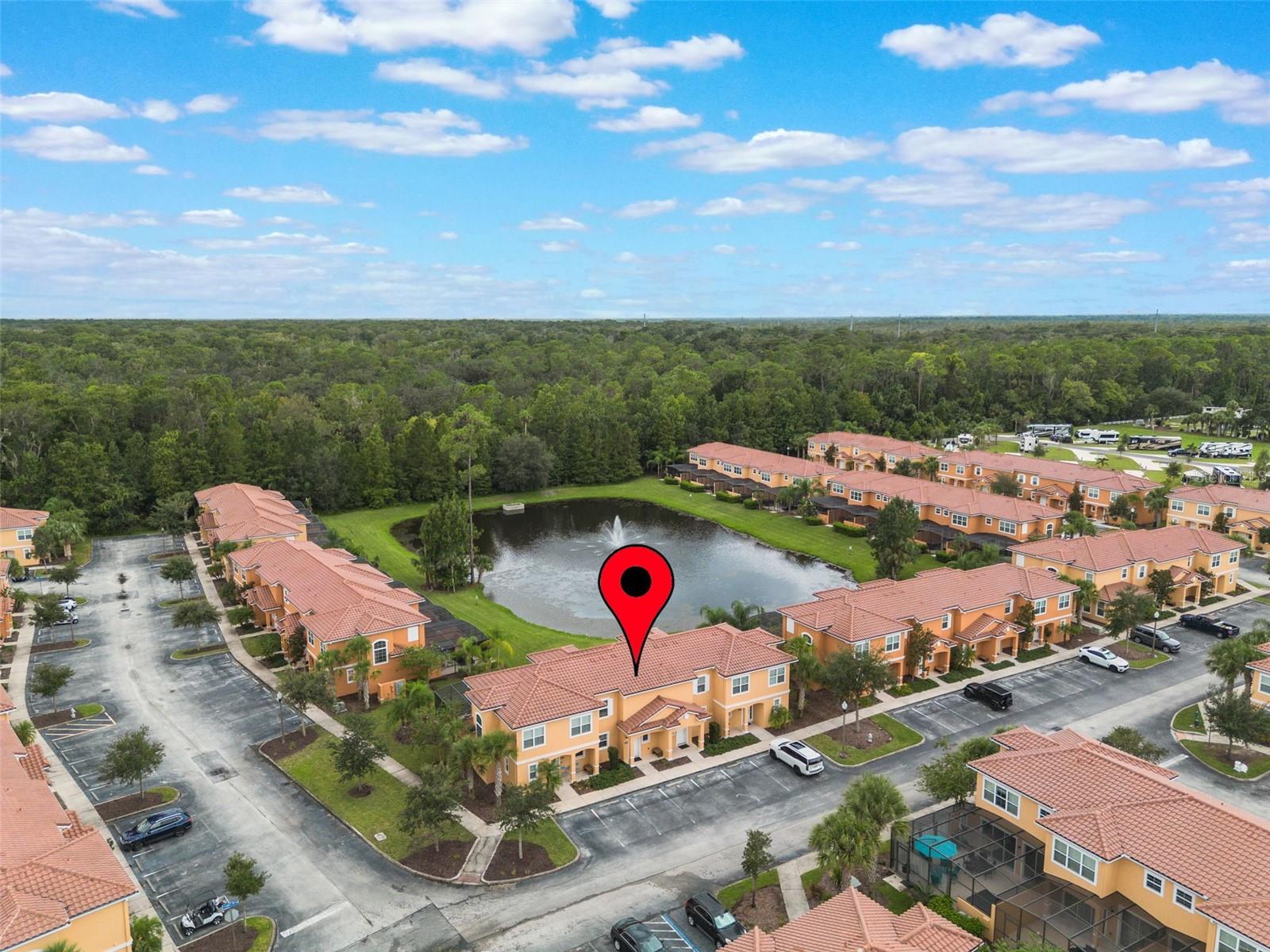 Welcome to your next great investment opportunity or personal vacation haven at 5752 Lesabre Drive, a fully furnished 2-bedroom, 2.5-bathroom townhome nestled within the highly sought-after Regal Oaks Resort. This property is a turnkey gem, ready for you and your guests to enjoy from day one. The spacious and open floor plan flows seamlessly to a private, screened-in patio with a hot tub and serene water views, offering a tranquil space to relax and unwind after a day of adventure. Ideally suited for vacation home buyers or investors, this townhome's prime location makes it an attractive option for short-term rentals, promising a high-demand property with excellent rental potential. Beyond the front door, the Regal Oaks community offers an abundance of resort-style amenities that will delight every guest. Enjoy the expansive pool complex with thrilling waterslides, a refreshing pool, and a relaxing hot tub. Stay active at the on-site fitness center or challenge friends and family to a game on the tennis courts. With on-site restaurants and a poolside bar, dining is always convenient and enjoyable. The resort's location is truly unbeatable, just minutes away from Central Florida's world-famous attractions, including Walt Disney World, Universal Studios, and SeaWorld. It is also within easy reach of a vast array of dining and shopping options, including the charming Old Town, making it the ideal base for a memorable vacation.