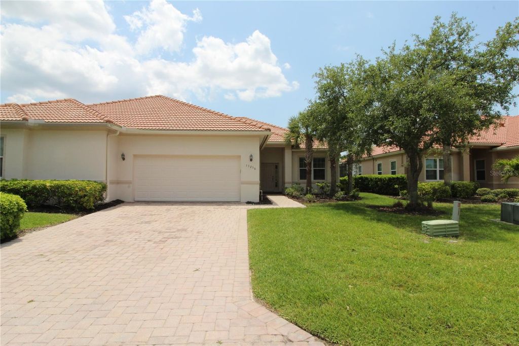 Photo of 13256 Creekside Lane, Port Charlotte, FL 33953 (MLS # C7510500)