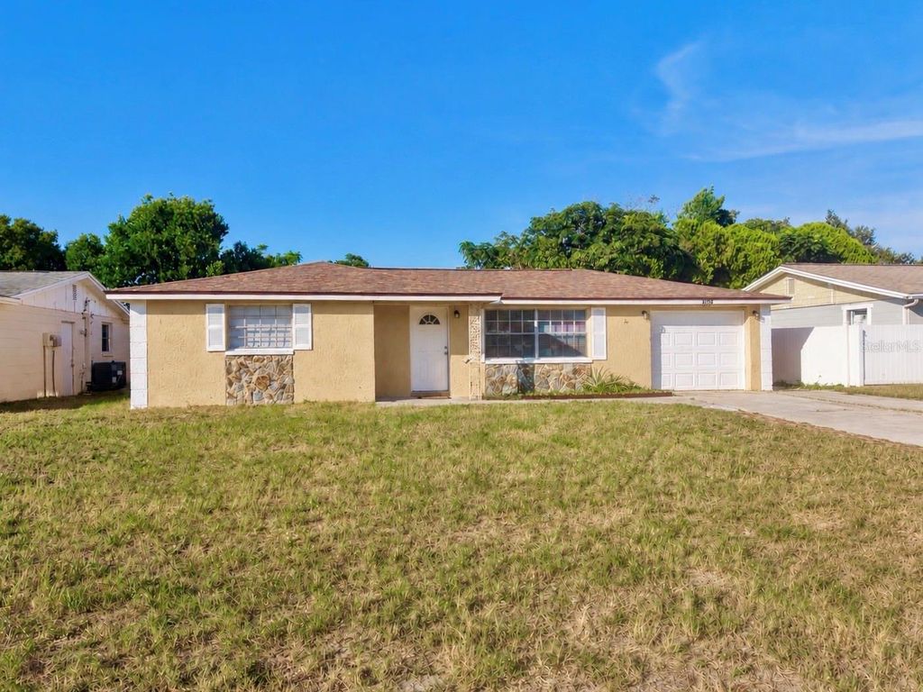 Photo of 5054 School Road, New Port Richey, FL 34653 (MLS # TB8462077)