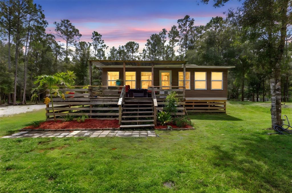 Photo of 1200 Berrybush Street, Bunnell, FL 32110 (MLS # V4945187)