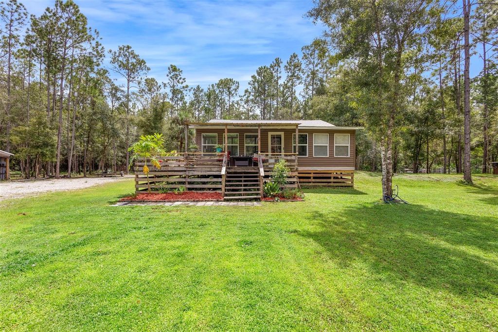 Photo of 1200 Berrybush Street, Bunnell, FL 32110 (MLS # V4945187)