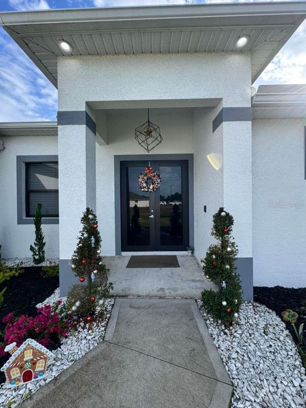 Photo of 407 Ranier Avenue, Lehigh Acres, FL 33974 (MLS # S5141053)