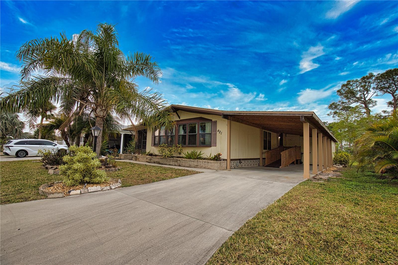 Discover the perfect opportunity to make this house your dream home! Ideally situated with captivating water views and nestled by the stunning Myakka Forest, this open-concept residence boasts an exceptionally spacious design. The seamless flow between the kitchen, dining room, and living room creates an inviting atmosphere, perfect for entertaining friends and family. Step into the generously sized Florida Room, where you can revel in the picturesque views of one of the largest lakes in the region and the natural beauty of the Myakka Forest. Retreat to the serene primary bedroom, complete with a luxurious ensuite bathroom that features a walk-in shower, along with ample storage and a linen closet. Your guests will feel right at home in the comfortable secondary bedroom, conveniently located in the pet-friendly area, allowing your furry companion to bask in paradise by your side. This remarkable home is one that you simply must see! Discover the enchanting community of La Casa, where 974 stunning homes are elegantly nestled among a tapestry of native trees, offering a serene escape surrounded by spacious common areas and eight picturesque lakes. Our generous lots average an impressive 60 by 80 feet, providing ample space for your dream home. Perfectly situated between Sarasota and Fort Myers, La Casa embodies the ultimate lifestyle on Florida’s Gulf Coast—a true boaters paradise with direct access to the breathtaking Gulf of Mexico. Enjoy the convenience of nearby shopping, exciting sightseeing, world-class golfing, and abundant fishing and boating opportunities, all while indulging in the rich culture and refined elegance that Southwest Florida is celebrated for. As you immerse yourself in the warmth of Southwest Florida’s winters, you’ll find yourself in a relaxed and unhurried atmosphere, far removed from the hustle and bustle of the east coast. Our community is adorned with lush, mature landscaping that reflects the loving care both residents and management dedicate to preserving its beauty. At La Casa, you’ll discover some of the finest pools in the area. Our crowning jewel is a magnificent 40 by 60-foot swimming pool, maintained at a perfectly inviting 87 degrees. Just a short stroll away, you’ll find our cozy 20 by 40-foot pool, nestled charmingly between the clubhouse and the Activity Building. Both pools feature adjacent hot tubs, ideal for unwinding after a refreshing day of golf or an invigorating game of tennis. Stay connected while basking in the sun with our complimentary wireless Internet (Wi-Fi), available at the Clubhouse, Activity Building, and Recreation Hall. Whether you’re catching some rays or catching up on emails, La Casa has it all. Does this sound appealing? La Casa is not just a community; it’s a welcoming family-friendly haven. Enjoy the tranquility of your surroundings, with the vibrant energy of nearby attractions just a heartbeat away. Come visit our charming self-contained oasis and experience firsthand why La Casa is the ultimate destination for snowbirds and year-round residents alike!