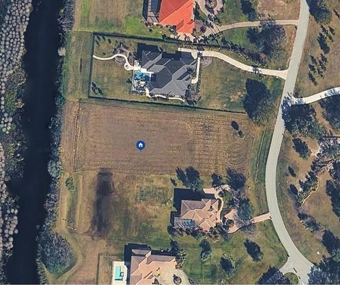 Photo of 10525 Broadland Pass, Thonotosassa, FL 33592 (MLS # A4679922)