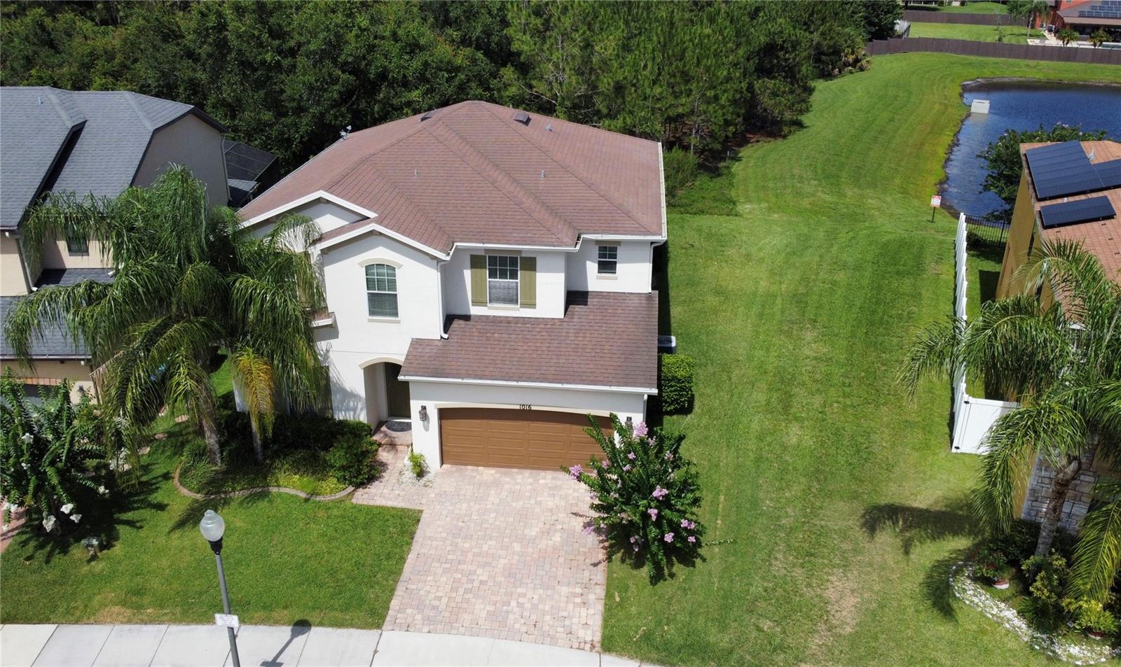 This beautifully maintained 4-bedroom, 2.5-bath pool home with an open floor plan is the one you’ve been waiting for! Nestled on an oversized corner lot in the sought-after Reserve at Golden Isle, this two-story gem backs up to a tranquil conservation area with no rear neighbors, offering the perfect blend of privacy and convenience.
This
Step inside to discover a bright and functional layout ideal for both everyday living and entertaining. In addition to the spacious living and dining areas, the first floor features a large bonus room—perfect for a home office, library, playroom, or even a guest room. The kitchThisen boasts granite countertops, 42” cabinets, stainless steel appliances, and a central island that opens seamlessly into the common areas.
Upstairs, all four bedrooms await, including a generous master suite with tray ceilings, a large walk-in closet, and a spacious en-suite bath.
Enjoy Florida living at its finest in your screen-enclosed pool and expansive backyard retreat. The covered lanai is ideal for outdoor dining, entertaining, or simply relaxing under the stars.
Additional highlights include:
New luxury vinyl flooring (2025)
New WiFi-enabled garage door opener (2025)
New water heater (2025)
2-car garage with extended driveway parking
Located just minutes from Waterford Lakes Town Center, UCF, and Orlando International Airport, and with easy access to the Space Coast, this home is a great fit for professionals working at SpaceX, Blue Origin, Lockheed Martin, and more. You’ll also be close to shopping, dining, great schools, and all of Central Florida’s world-class attractions.
