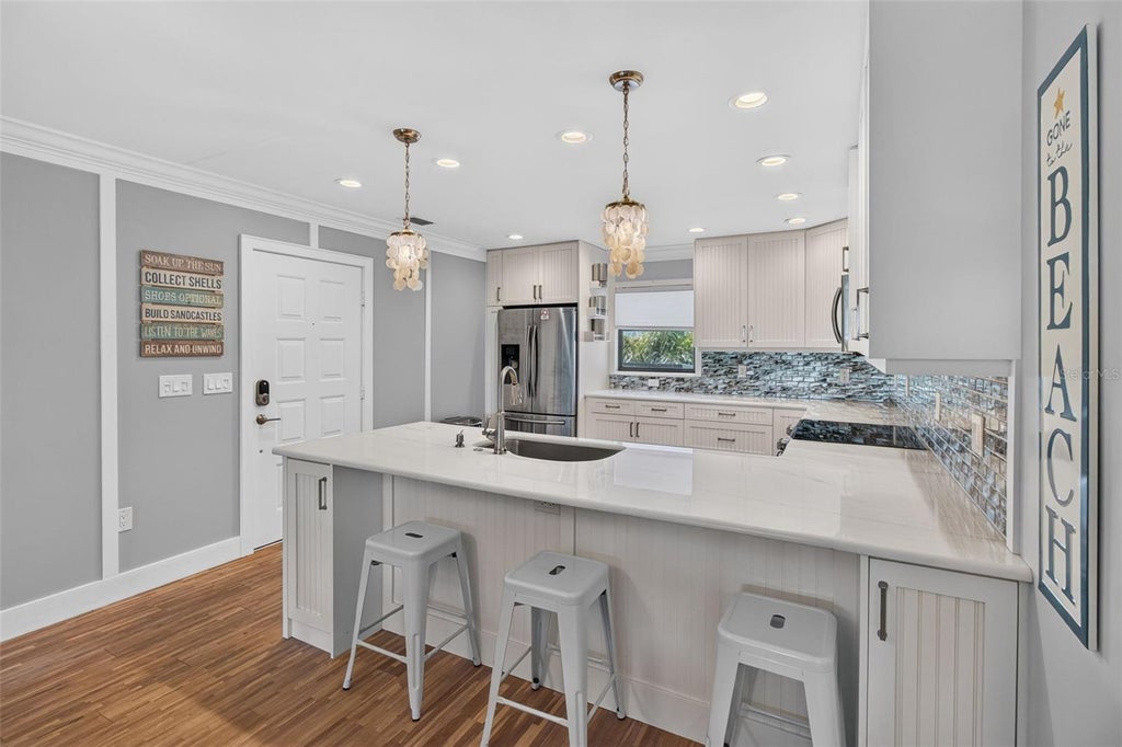 Photo of 326 Windrush Boulevard #202, Indian Rocks Beach, FL 33785 (MLS # TB8549147)