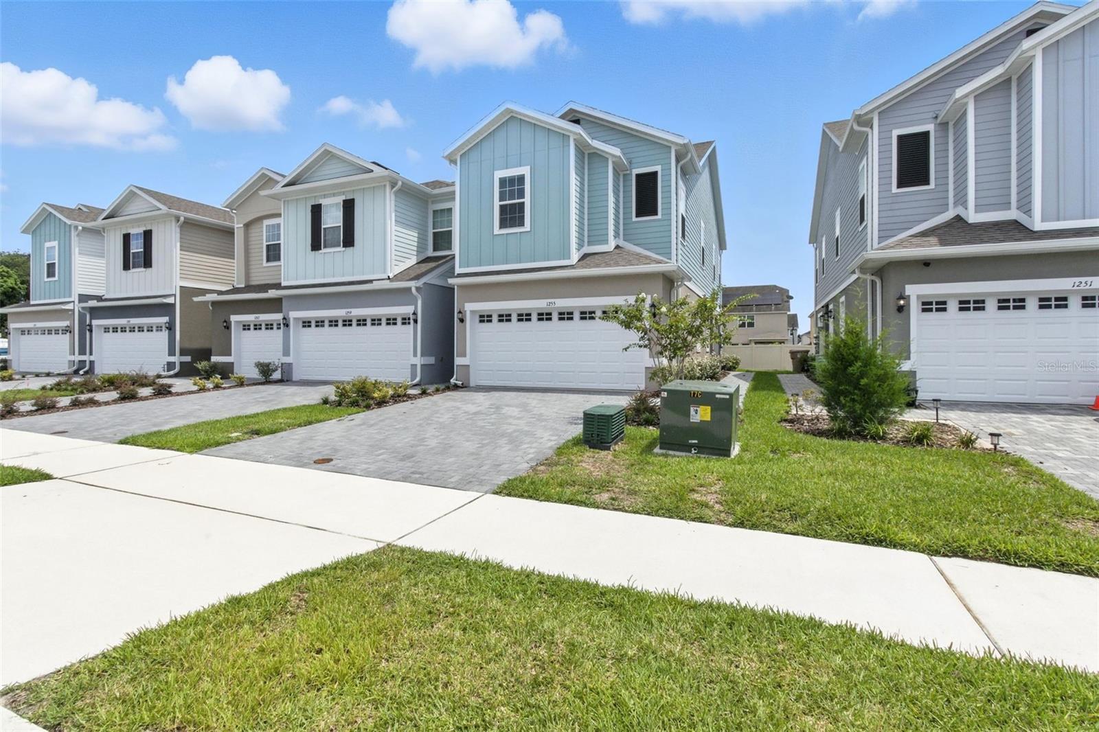 This well-appointed end-unit townhome features a private side entrance and a spacious two-car garage for added convenience. The main level offers a thoughtful layout with a separate foyer that provides privacy between the family room and powder bath, while the open kitchen and dining area create an ideal space for entertaining. Upstairs includes a flexible loft, two secondary bedrooms, a full bath, and a laundry area. The owner's suite serves as a comfortable retreat with a large walk-in closet and a private bath featuring dual vanities, a spacious walk-in shower, and a linen closet for added storage. Located in Brixton, a quiet St. Cloud community just minutes from Lake Nona, Medical City, major highways, and top-rated schools. Buyers can receive $10,000 toward closing costs and take advantage of a 4.99% interest rate on FHA or VA loans or 5.99% on conventional loans when using the builder's preferred lender.