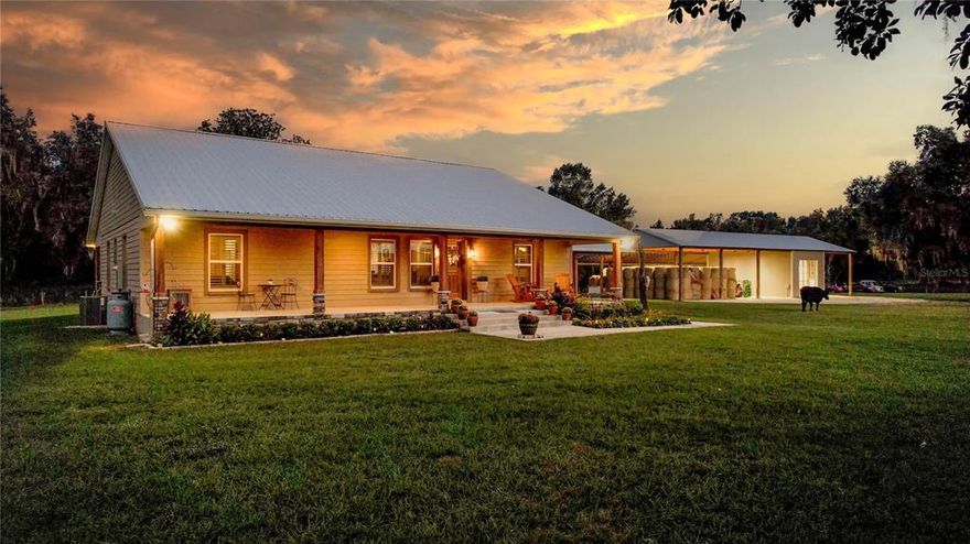 ''Land is the only thing in the world that amounts to anything'' ~Margaret Mitchell and this land is breathtaking. Welcome to one of the most beautiful ranches in the state of Florida! A&A Cattle Co sits perfectly on 73 +/- incredible acres in the heart of south Sumter County where country is still country! As you drive down the winding road, you enter this private paradise tucked away in tranquility and peacefulness. Sit back and enjoy the stunning sunrises and breathtaking sunsets year-round. This property is surrounded by large tracts of private land with no shortage of deer, turkey, rabbits, dove, turtle and fish. For the avid hunter, conveniently located a few short miles from the Richloam Wildlife Management Area, Withlacoochee State Forest and the Green Swamp Nature Preserve. Capitalize on the existing lucrative hunting operation of the highly sought-after Osceola Turkey using the unique all natural custom-made stationary blind. Fish from the bridge or stand along the banks of the canopied flowing creek that feeds into Gant Lake and draws in an abundance of additional wildlife. The new 60X100X18 custom barn is incredible and loaded with upgrades such as a 20x40 enclosed workshop with 3 roll-up bay garage doors and concrete flooring. This barn offers LED lighting, 50-amp RV hook up, 200-amp service, with additional 220 volt outlets, running water, 2ft on-center rafters, 10x10 posts, 26 gauge metal roof, and a lime rock base. It has the ability to hold 100's of rolls of hay, tractors and tons of farm equipment but can easily house your boats, RV's, trucks and toys. Currently being used for a cow calf operation the land boasts improved lush pastures that are cross fenced for management, 5 fenced acres with zoned irrigation and a commercial well (6 inch well, 10 horsepower, 3 phase pump) that is invaluable for homesteading and farming opportunities. If you are looking for authentic Florida treasures, the property includes a 100-year-old picturesque cracker cabin that sits near a small pond with majestic cypress trees and noble grandfather oaks scattered throughout. The ranch style home built in 2020 includes thoughtful details and tons of custom upgrades, and incredible porch views. Noteworthy features of the home are: custom kitchen w/double wall oven, electric cooktop, solid wood custom cabinetry, a stone wrapped bar, granite countertops, gas fireplace with stone accents and a raw edge wood mantel, plantation shutters, tankless hot water heater, mudroom with half bath, concrete siding, metal roof and gutters. The screened in back porch screams country with cypress ceilings and remote-controlled ceiling fans that would make your grandma jealous! The postcard picture front porch that overlooks this beautiful property also includes the cypress ceilings and remote-controlled ceiling fans to keep you cool and comfortable while enjoying the stunning sunsets and all that all that nature has to offer. Whether you're looking for your own piece of paradise to call home or the opportunity to own a unique Florida retreat- this place offers it all! Centrally located between Orlando and Tampa International Airports, within an hour of all Florida major attractions and within two hours of Florida's pristine beaches, what more could you ask for? Property located 5 miles to the Webster cattle market, 64 miles to Tampa International airport, 41 miles to the Gulf of Mexico, and 51 miles to Ocala.