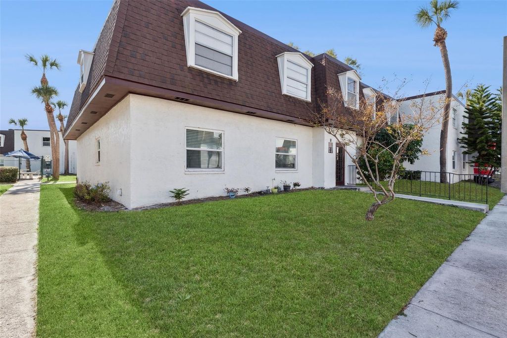 Photo of 9122 Tudor Drive #M102, Tampa, FL 33615 (MLS # O6361511)